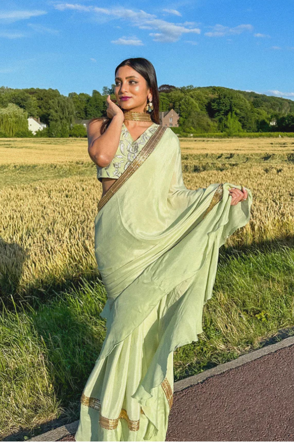 Buy Ruffled Chiffon Saree and Exquisite Silk Blouse with Collar Embellishments