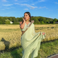 Ruffled Chiffon Saree and Exquisite Silk Blouse with Collar Embellishments