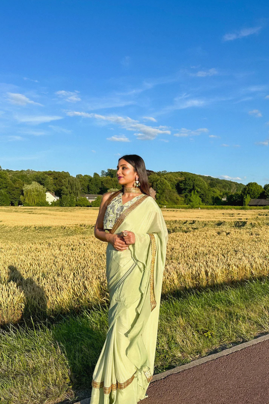 Ruffled Chiffon Saree and Exquisite Silk Blouse with Collar Embellishments