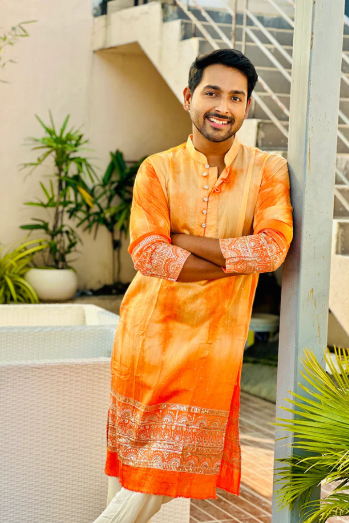 Exquisite Orange Embroidered Kurta with Elegant Border Detail