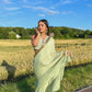 Ruffled Chiffon Saree and Exquisite Silk Blouse with Collar Embellishments