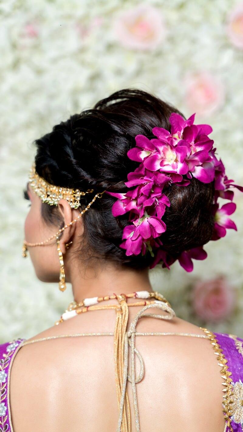 Elegant Pink Lehenga | Bridal bun, Indian bridal hairstyles, Bridal braids