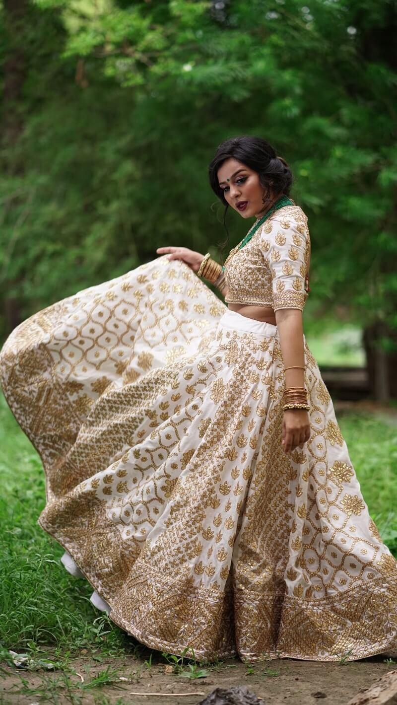Gold Graceful Pleated Banarasi Lehenga Choli In With Embellished Unstitched  Blouse & Matching Dupatta